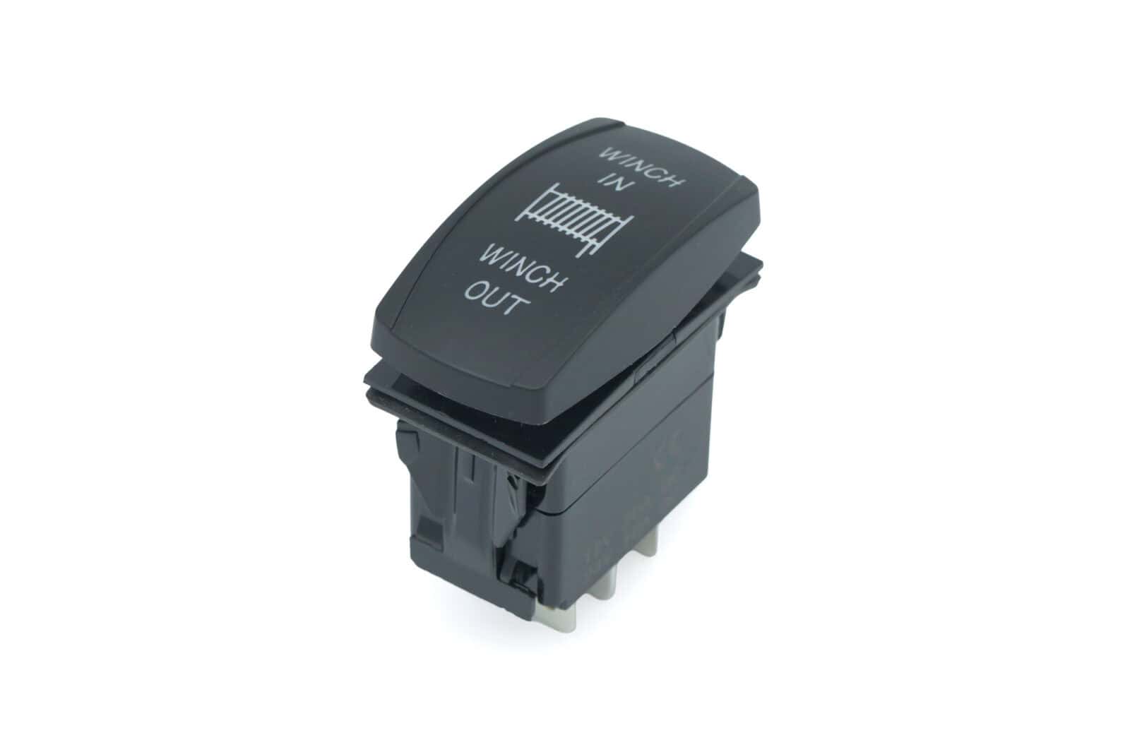 Rocker switch for winch control, durable and reliable for off-road use.